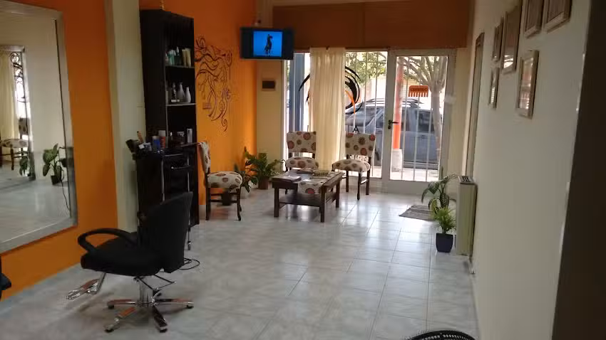 A Tu Estilo Peluquer&iacute;a