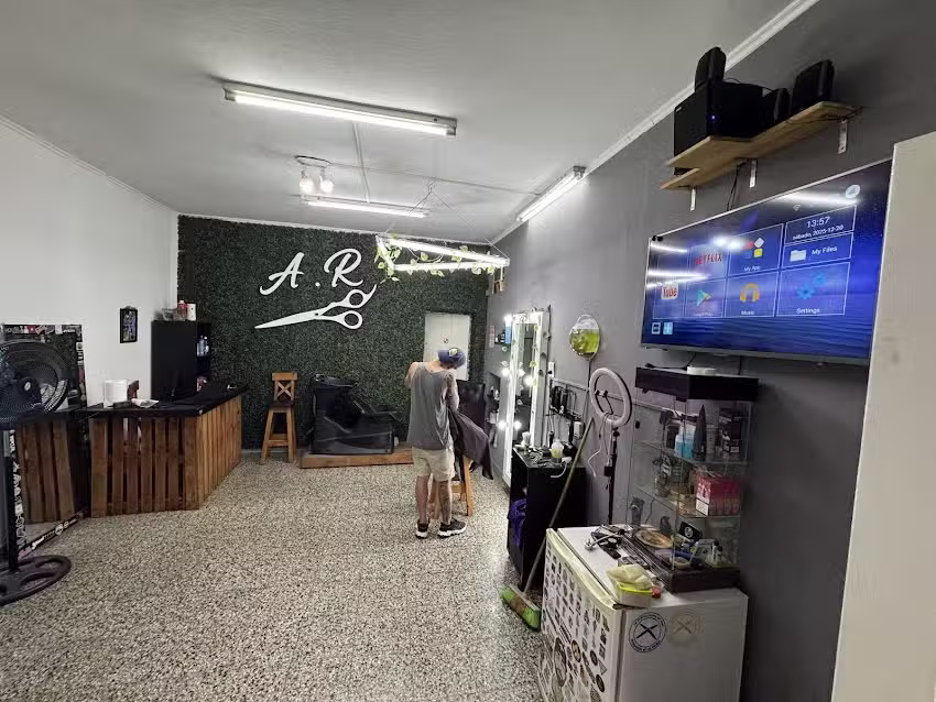 AGUSTIN RISSO PELUQUERIA