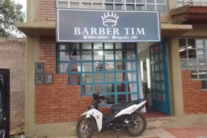 BARBER TIM