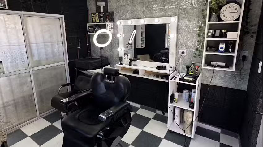 Barber&iacute;a Carrara