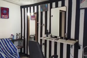 Barberia corta la bocha