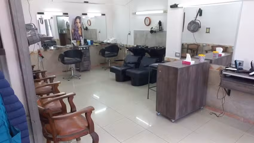 Mercedes & Hernan Peluquer&iacute;a Unisex