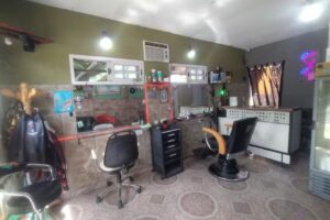 Pelu y barber&iacute;a CyF